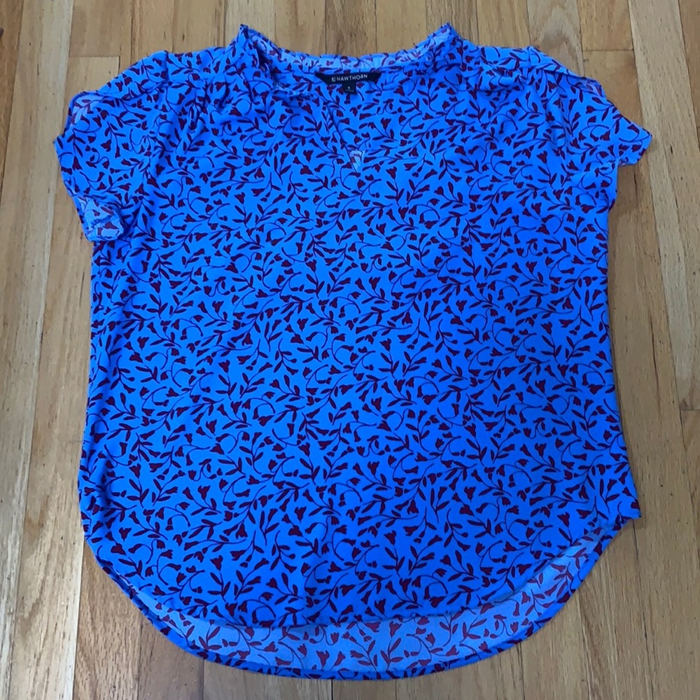 Blue blouse with red foliage design